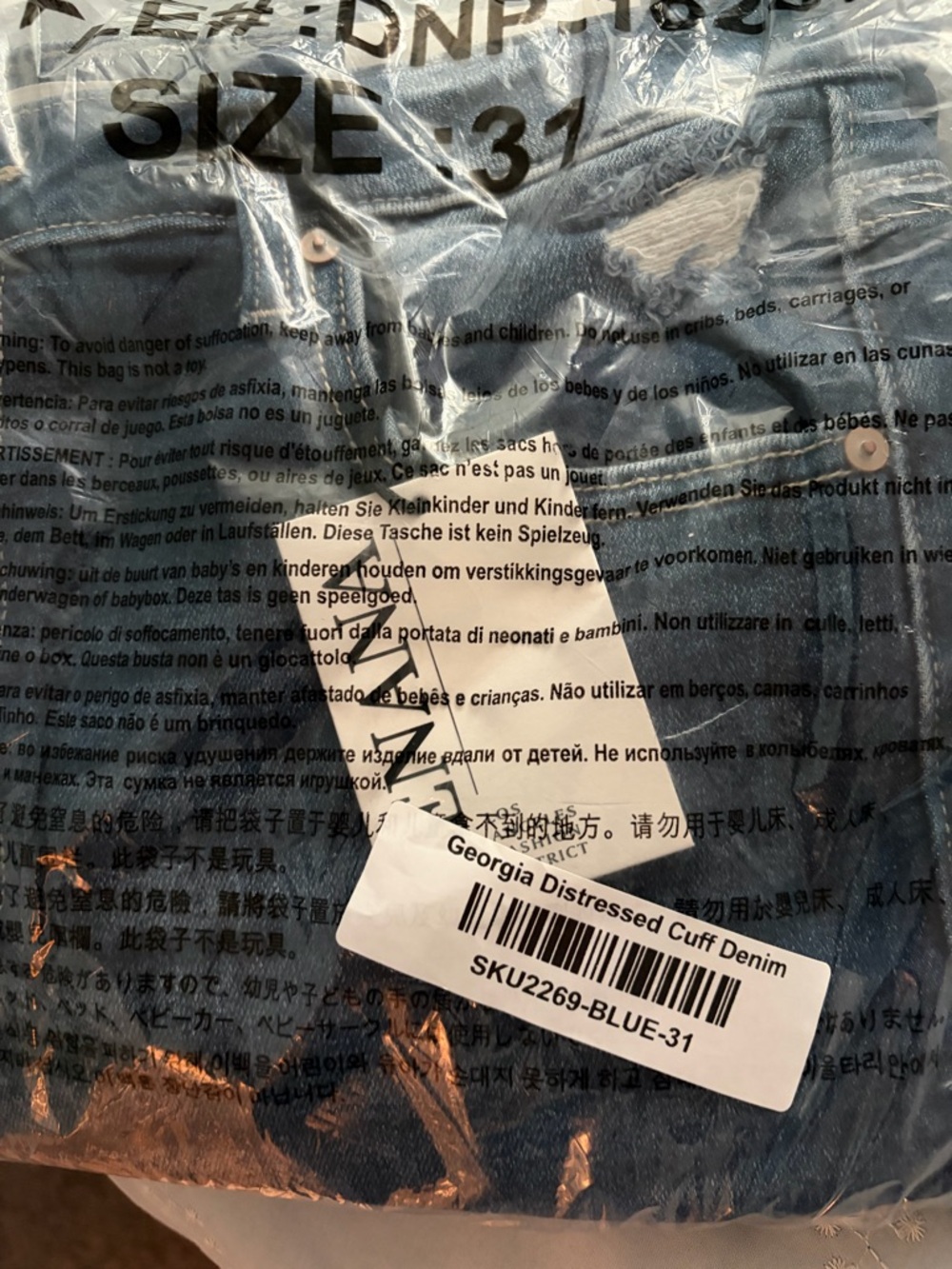 Paris Georgia Blue Distressed Cuff Boot Cut Jeans